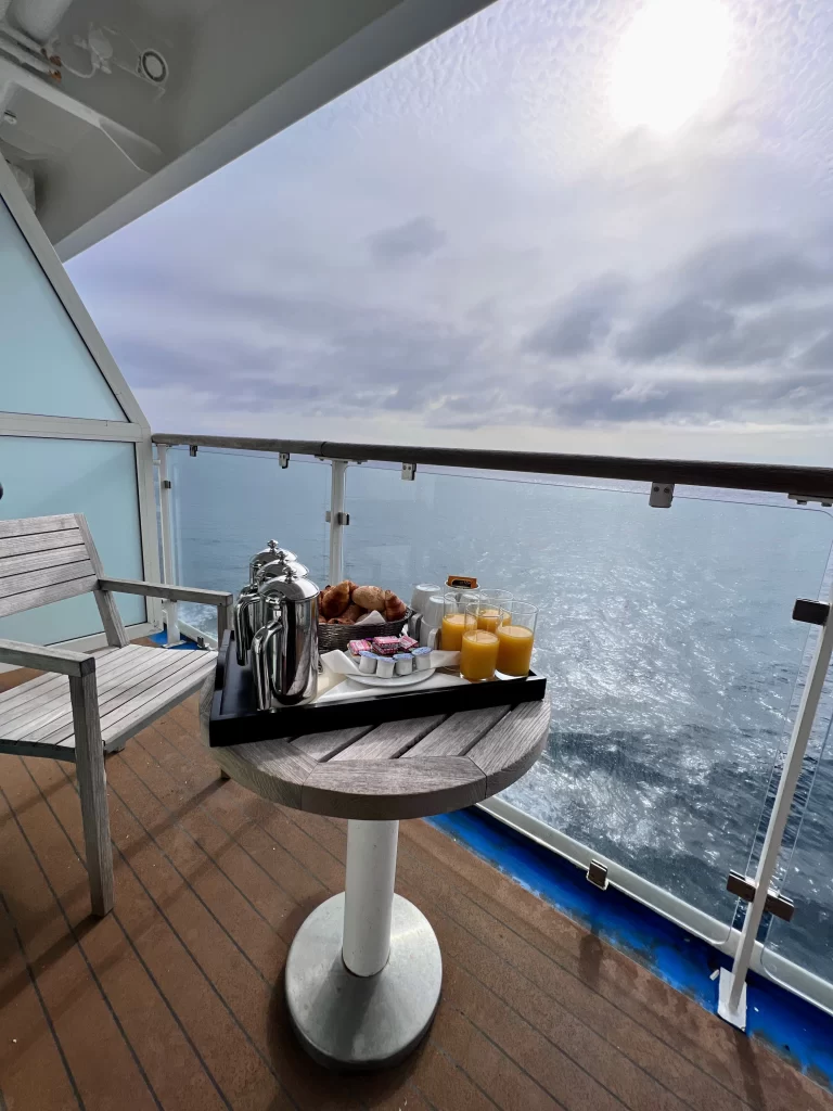 Breakfast tray on a table on a balcony on a cruise/ferry while in travel