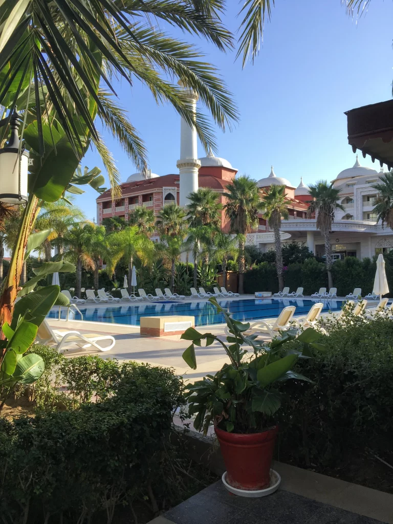view of a swimming pool in a resort in travel