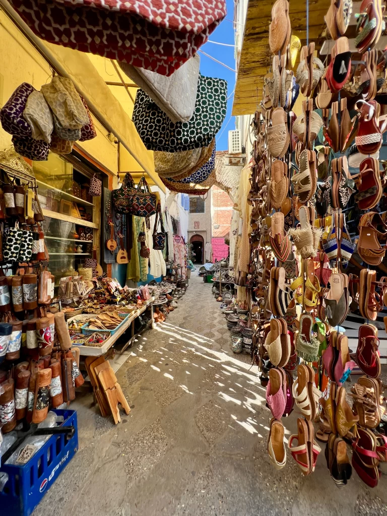 Street of Asilah with souvenir shops.