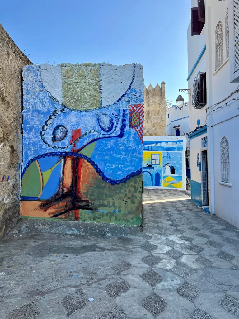 View of Asilah Medina street with murals.